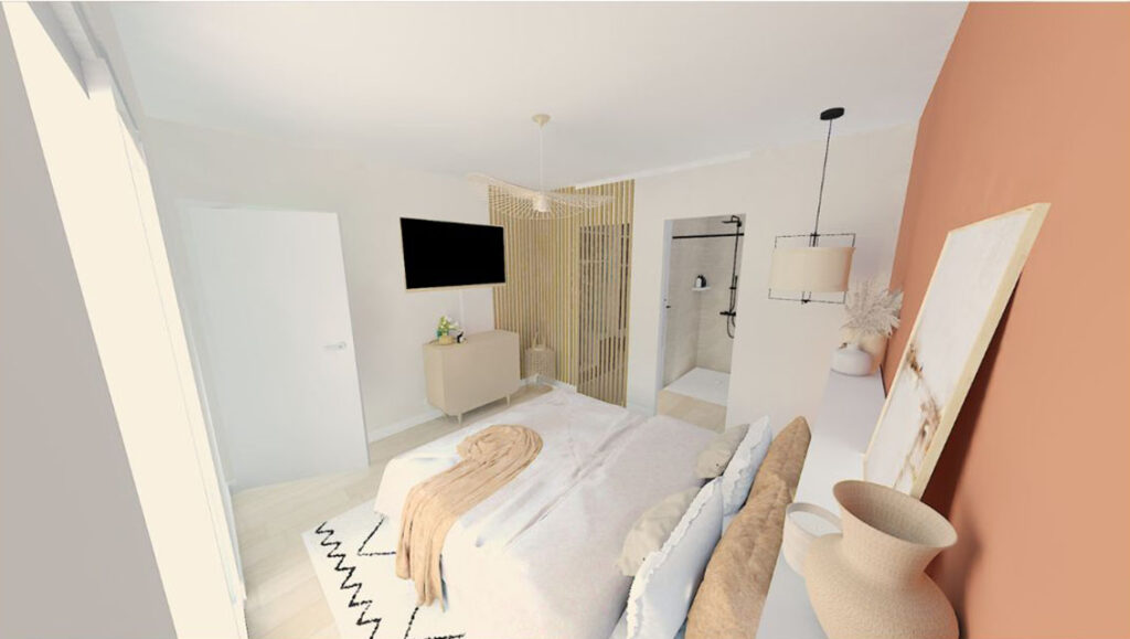 Chambre parentale chaleureuse avec salle d’eau attenante, claustra bois et mur terracotta – projet réalisé par ABL Intérieur à Berchères-la-Maingot.